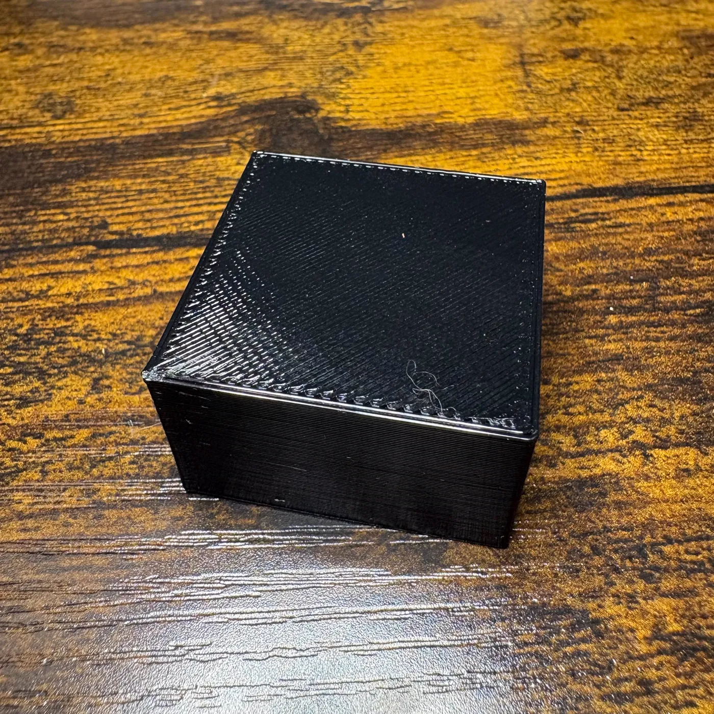 Black square bumper with cross hatch texture