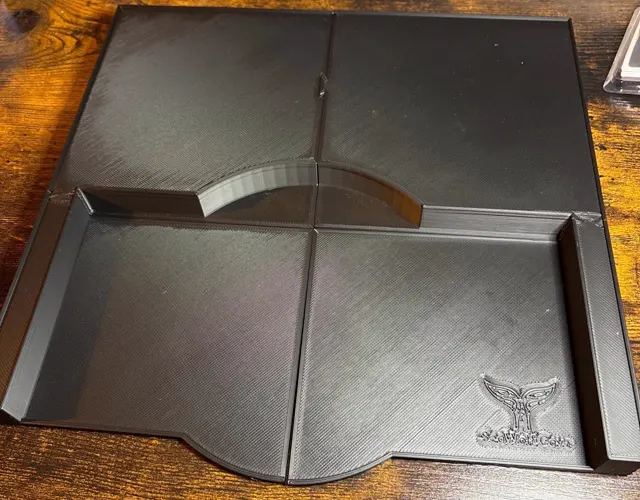 Black four section riser tray with the whale tail emblem